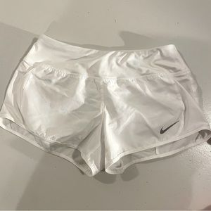 White Nike dri fit shorts with built in liner. Size S nwot.